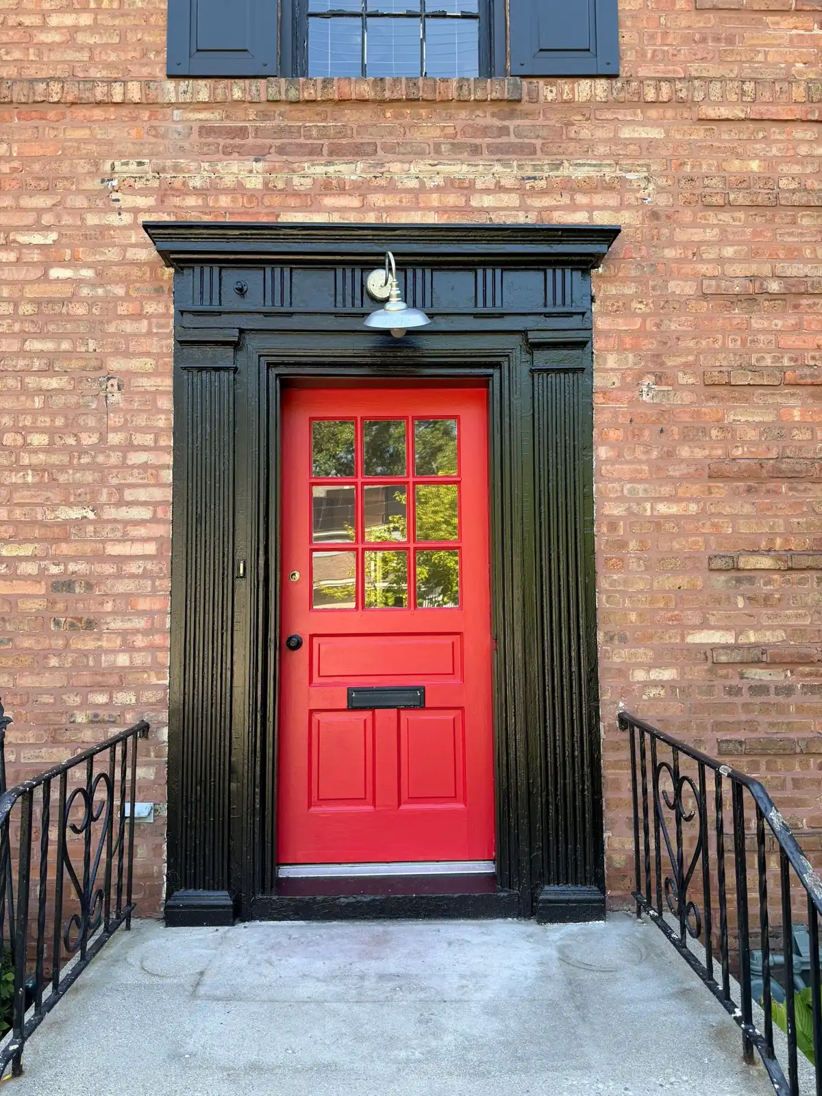 Red front door repaint in Evanston