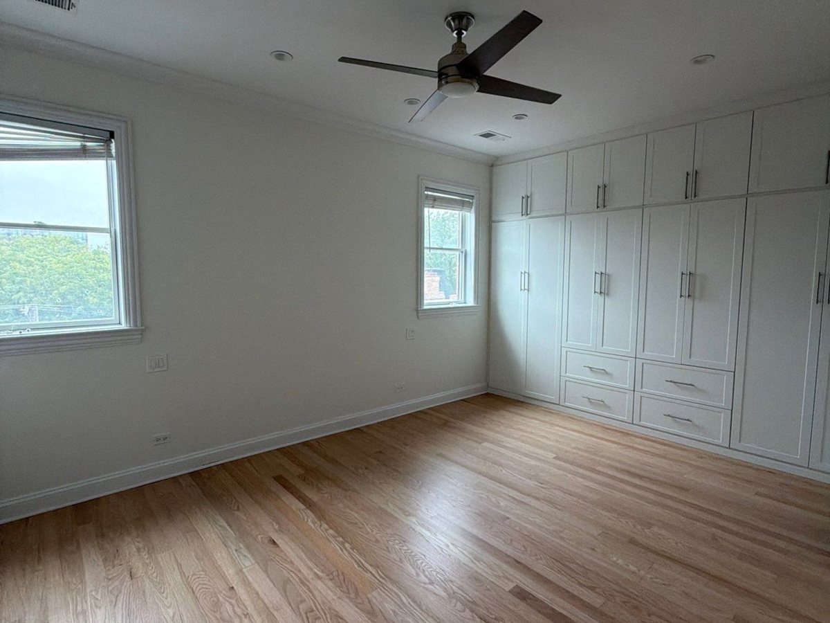Primary bedroom with built-in wardrobes in Alabaster