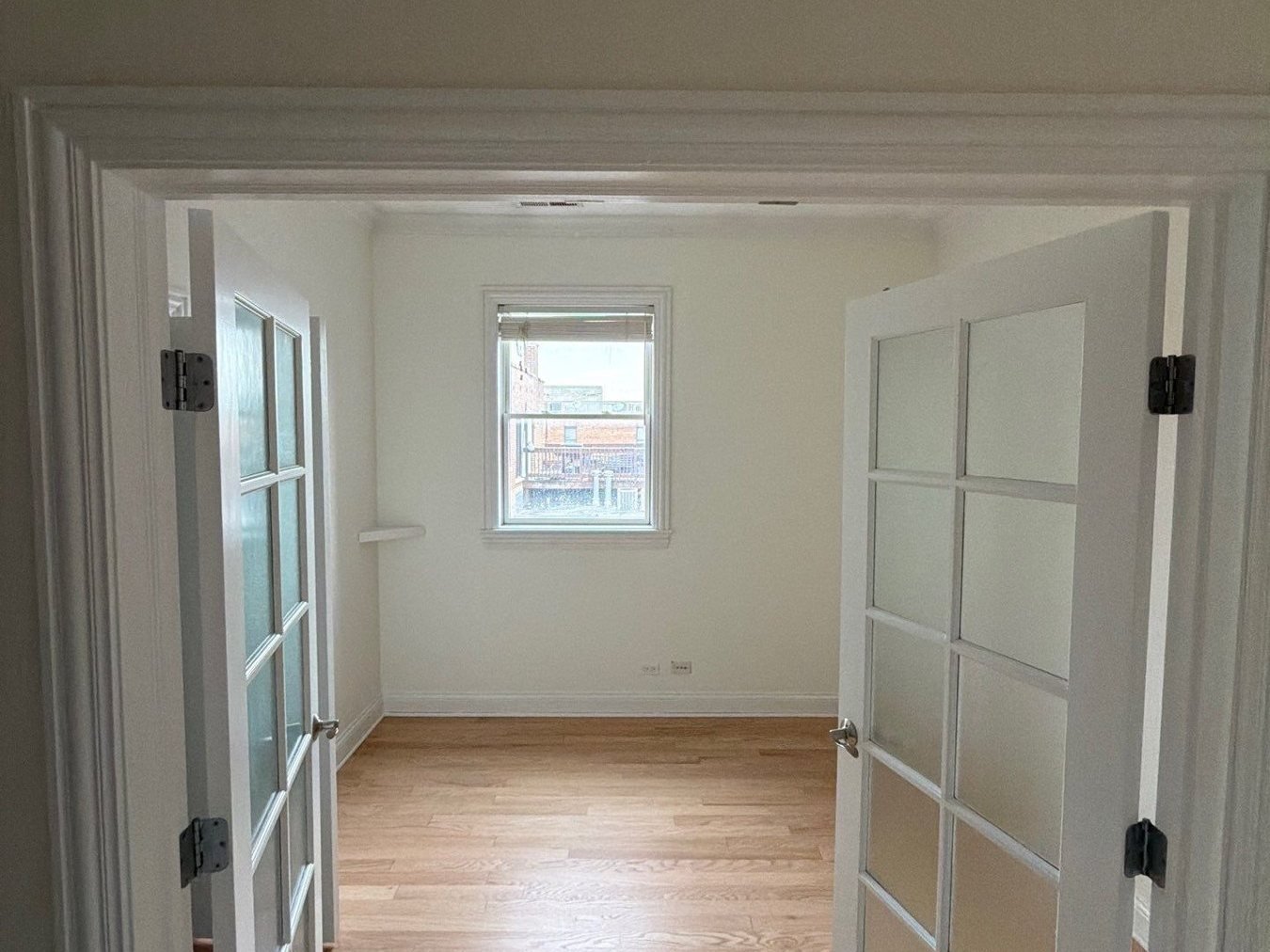 Bedroom with French doors painted in ProClassic semi-gloss