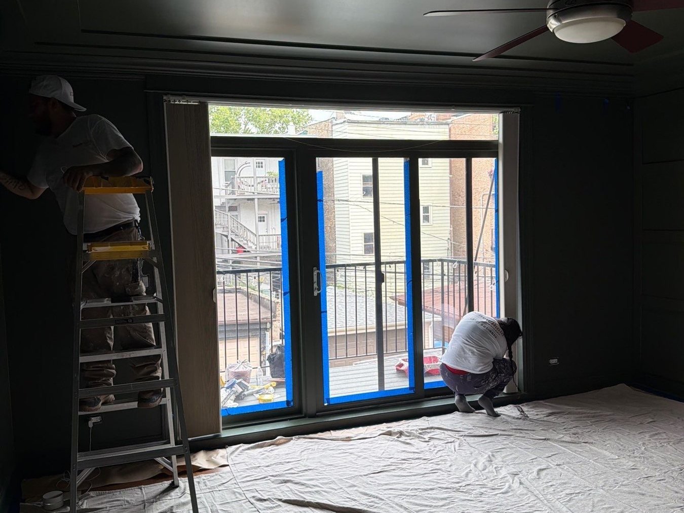 Lakeview master bedroom before painting with floors and windows protected