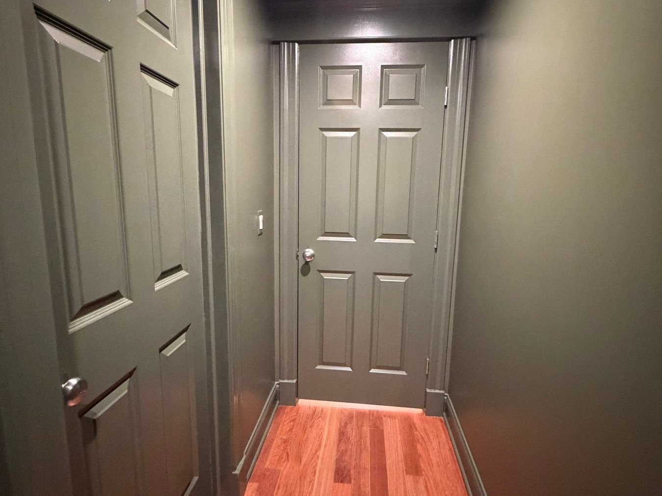 Closet doors painted to match the walls